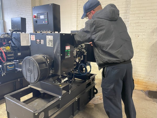 Workman Inspecting Machine